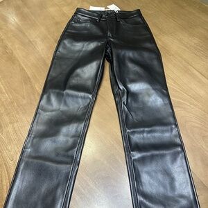 Good American black leather straight pants.